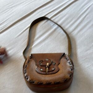 Vintage Brown Crossbody Bag with Curved Flap and Metal Studs